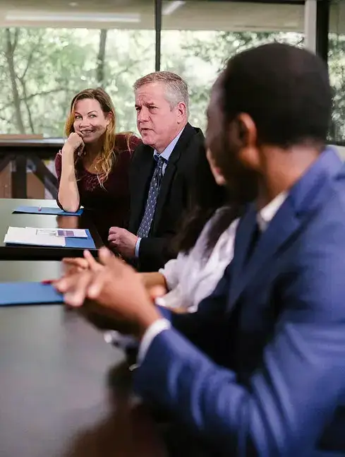 Business meeting discussion in conference room
