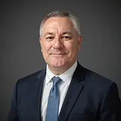 Smiling businessman in suit and tie portrait