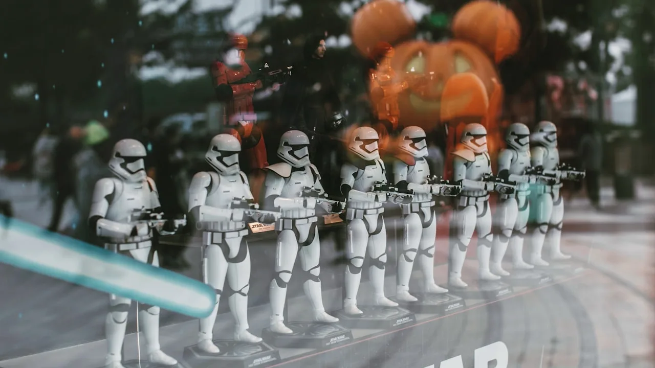 Star Wars stormtrooper figures in a shop display.