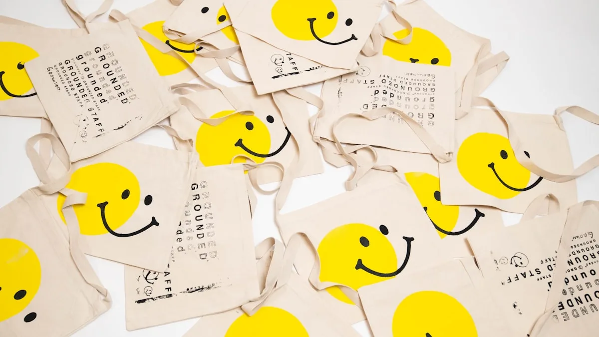 Tote bags with smiley faces and text