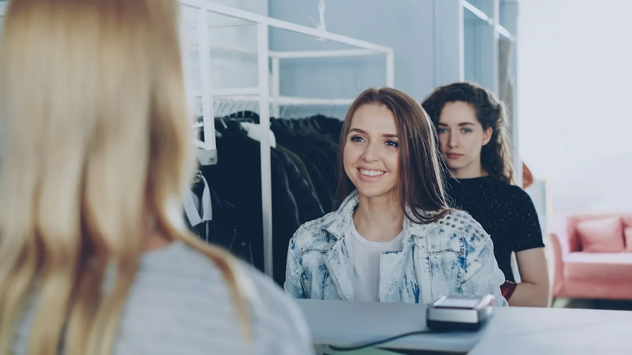 Smiling woman waiting in queue