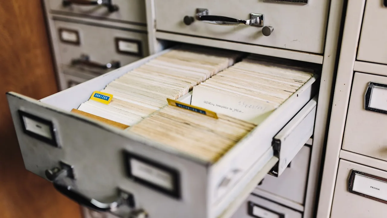 Open library card catalogue drawer with index cards