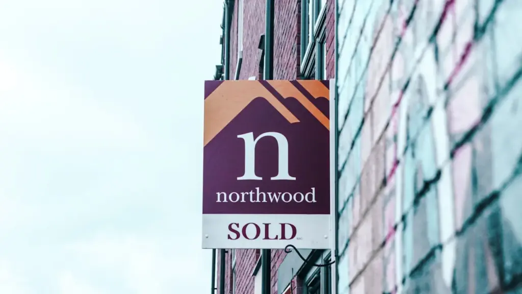 Northwood estate agent sold sign on building