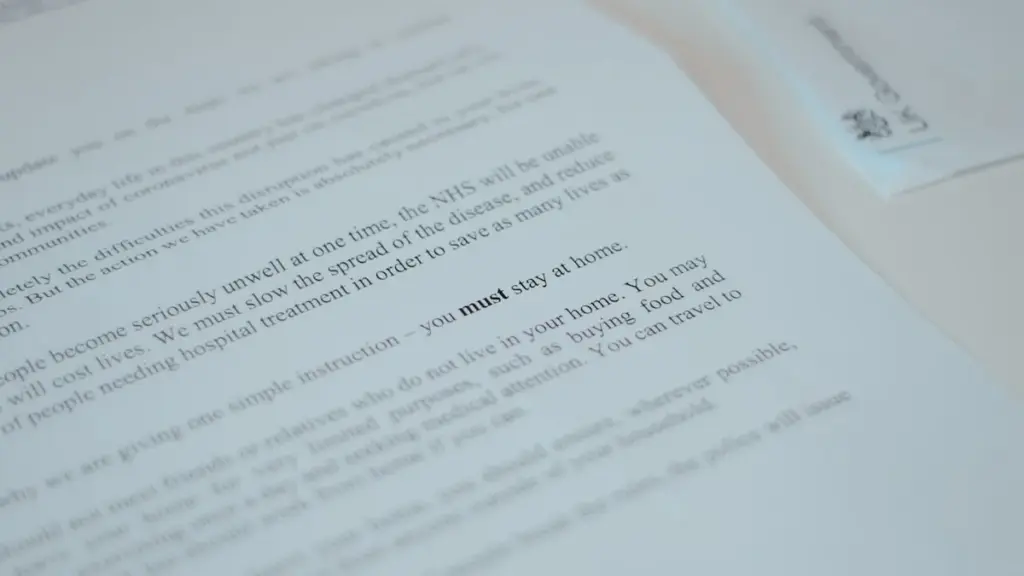 Close-up of government document stating 'must stay at home'.