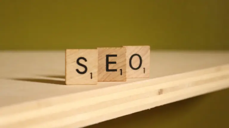 Wooden tiles spelling SEO on shelf
